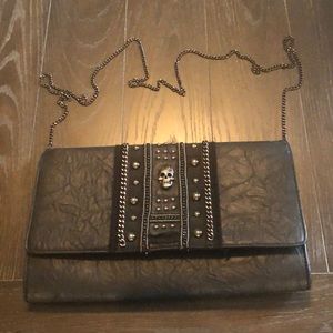 Torrid large skull shoulder clutch